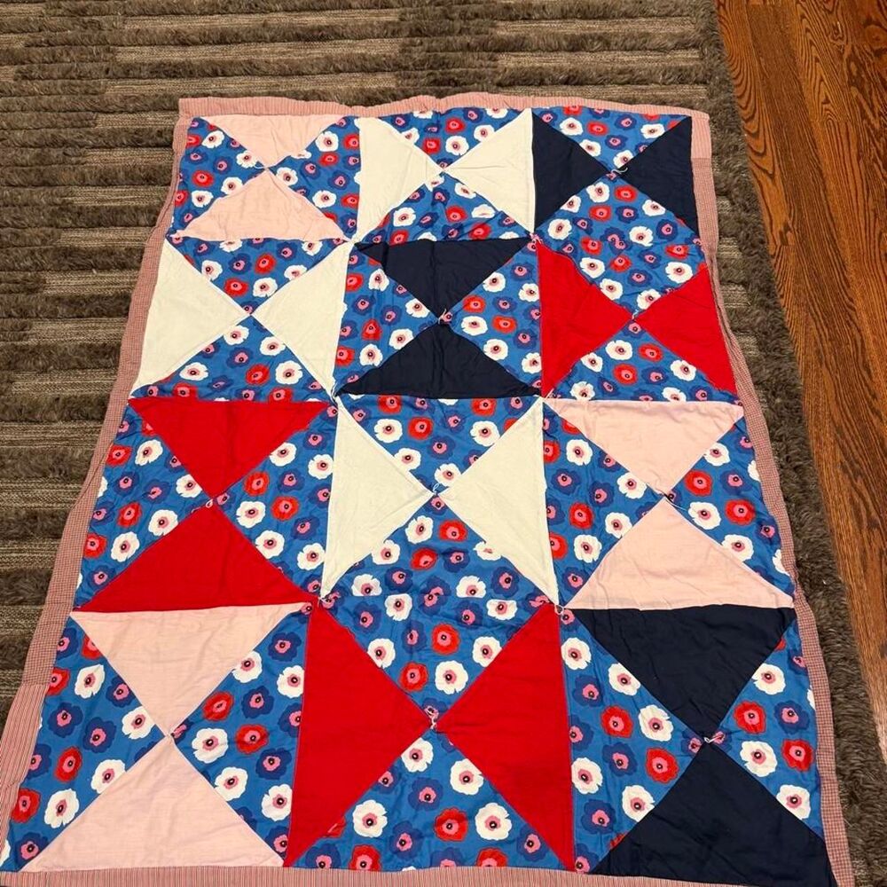 Handmade quilt with a floral pattern